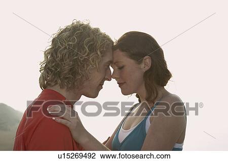 Stock Image - Portrait of a young couple.. Fotosearch