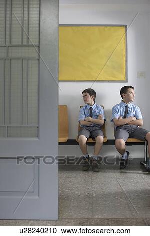 School boys sitting outside office View Large Photo Image Stock Image - School boys sitting outside office. Fotosearch