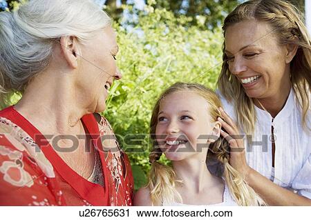 Stock Image - 3 generations together. Fotosearch