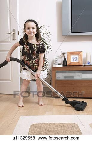 Stock Photo - Young girl doing housework. Fotosearch