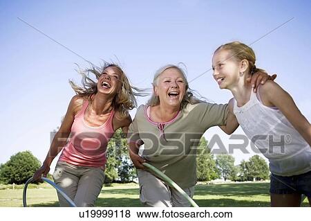 3 generation women with hula hops View Large Photo Image Stock Photo - 3 generation women with hula hops. Fotosearch