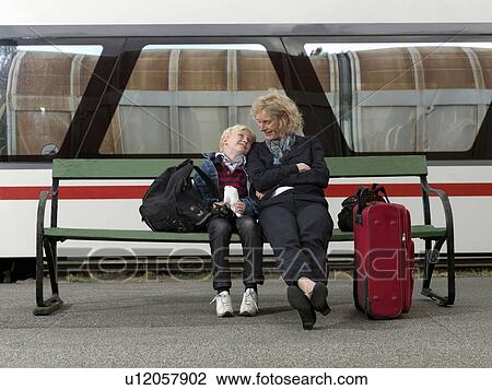 Grandmother and grandson on train station View Large Photo Image Stock Image - Grandmother and grandson on train station. Fotosearch