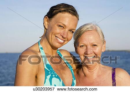 Portrait of mother and daughter View Large Photo Image Stock Photo - Portrait of mother and daughter. Fotosearch