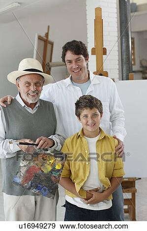 Stock Photo - Three generations painting in art studio. Fotosearch