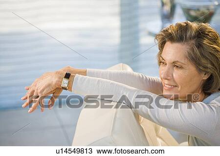 Woman Relaxing At Home View Large Photo Image Stock Image - Woman Relaxing At Home. Fotosearch