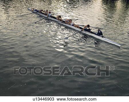 Stock Image - Crew recovering after race piece.. Fotosearch