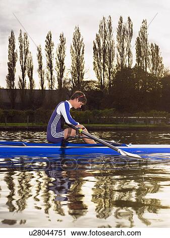 Skuller on river. View Large Photo Image Stock Image - Skuller on river.. Fotosearch