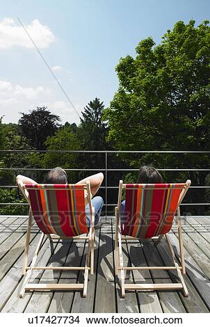 Picture - Couple enjoying the sun. Fotosearch