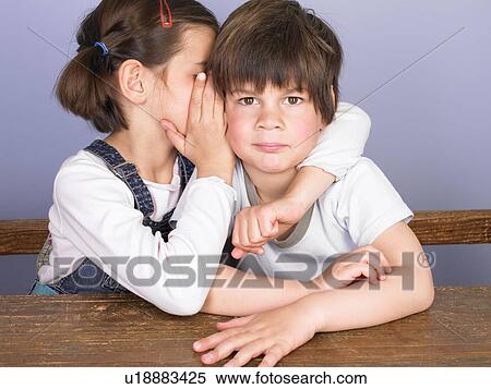 Girl and boy talking View Large Photo Image Stock Photography - Girl and boy talking. Fotosearch