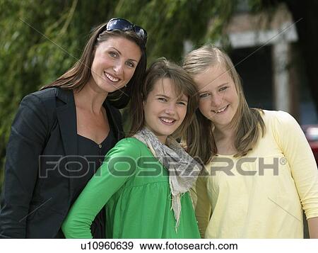 Mother with two teen age girls View Large Photo Image Stock Photo - Mother with two teen age girls. Fotosearch