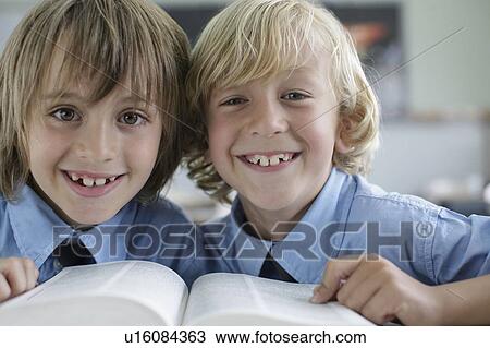 School boys reading in class View Large Photo Image Stock Image - School boys reading in class. Fotosearch