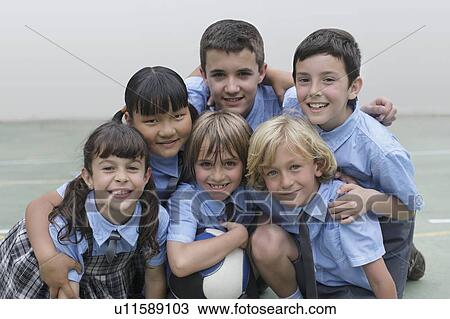 Stock Image - School children in group photo. Fotosearch