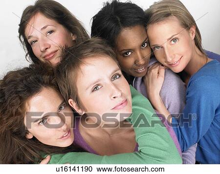 Women looking at the camera View Large Photo Image Stock Image - Women looking at the camera. Fotosearch