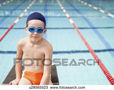 Boy at swimming pool (portrait) View Large Photo Image Stock Image - Boy at swimming pool (portrait). Fotosearch