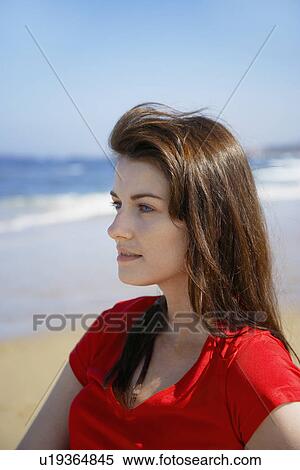 Young woman at beach View Large Photo Image Stock Photography - Young woman at beach. Fotosearch