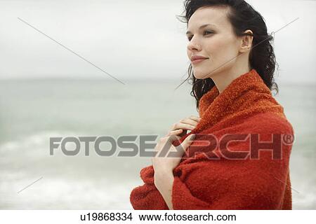 Picture - Young woman wrapped in towel. Fotosearch