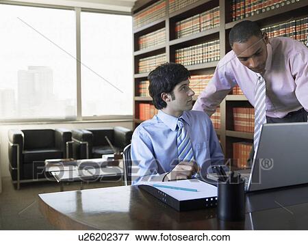 Businessmen using computer View Large Photo Image Stock Photo - Businessmen using computer. Fotosearch