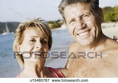 Stock Photo - Portrait of a senior man with a mature woman smiling. Fotosearch