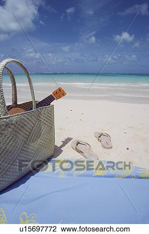 Close-up of a hand bag on sand View Large Photo Image Stock Image - Close-up of a hand bag on sand. Fotosearch