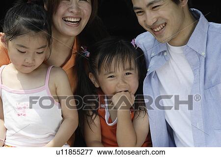 Stock Photo - A family portrait. Fotosearch