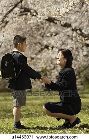 Mother and son smiling View Large Photo Image Stock Image - Mother and son smiling. Fotosearch