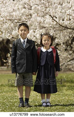 Portrait of boy and girl smiling View Large Photo Image Stock Photo - Portrait of boy and girl smiling. Fotosearch