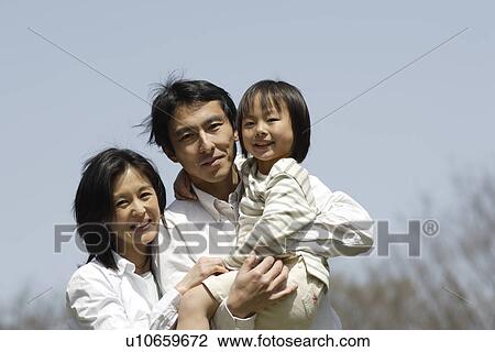Portrait of family smiling View Large Photo Image Stock Image - Portrait of family smiling. Fotosearch