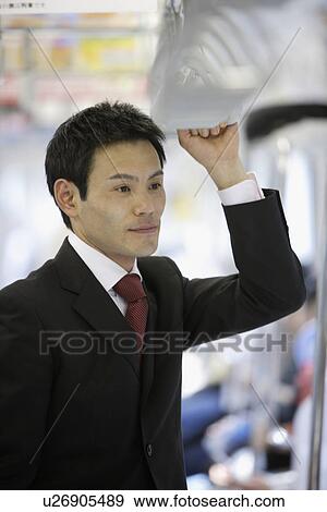 Businessman traveling, portrait View Large Photo Image Stock Photo - Businessman traveling, portrait. Fotosearch