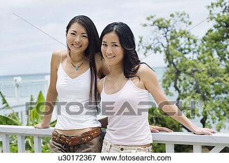 Portrait of young women smiling View Large Photo Image Stock Photo - Portrait of young women smiling. Fotosearch