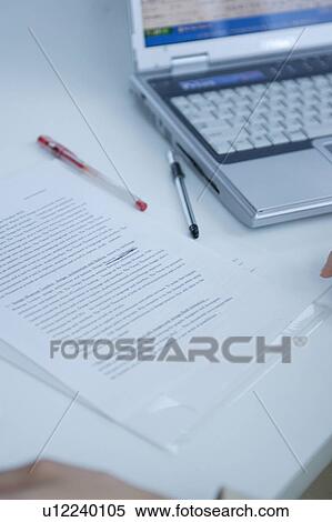 Documents and notebook computer at desk View Large Photo Image Stock Photography - Documents and notebook computer at desk. Fotosearch
