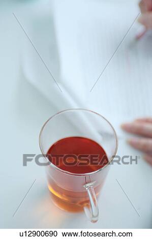 Tea cup on meeting table View Large Photo Image Stock Image - Tea cup on meeting table. Fotosearch