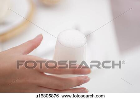 A woman's hand and glass of champagne View Large Photo Image Stock Photograph - A woman's hand and glass of champagne. Fotosearch