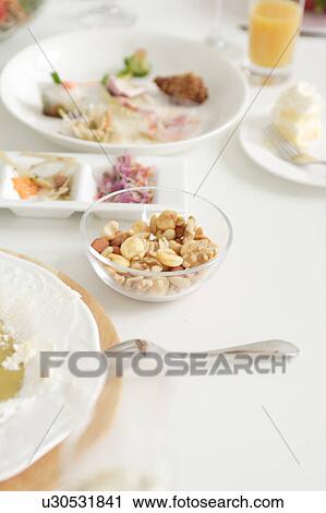 Appetizer and nuts at table View Large Photo Image Stock Image - Appetizer and nuts at table. Fotosearch