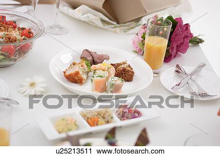 Food at table View Large Photo Image Stock Image - Food at table. Fotosearch