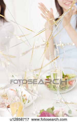Small group of young women celebrating View Large Photo Image Stock Photo - Small group of young women celebrating. Fotosearch