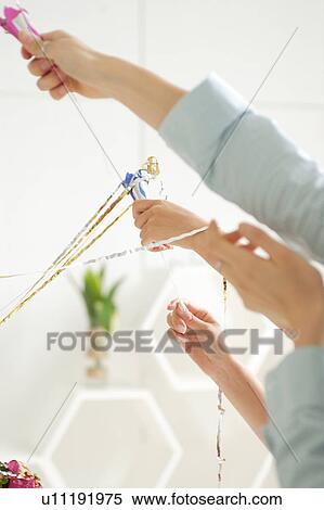 Small group of young women celebrating View Large Photo Image Stock Photography - Small group of young women celebrating. Fotosearch