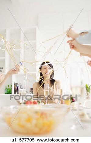 Small group of young women celebrating View Large Photo Image Stock Photography - Small group of young women celebrating. Fotosearch