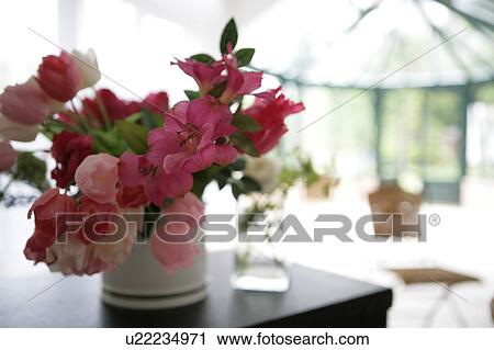 Stock Image - Close-up of flowers in vase. Fotosearch