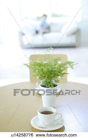 Cups of tea on table View Large Photo Image Stock Photograph - Cups of tea on table. Fotosearch