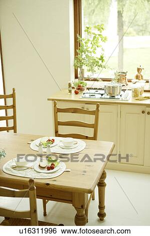Stock Photograph - Kitchen and dining room. Fotosearch