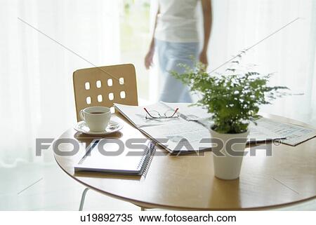 Newspaper on table with chair View Large Photo Image Stock Photography - Newspaper on table with chair. Fotosearch