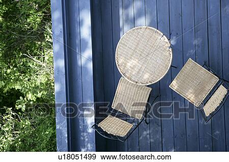 Table and two chairs on terrace View Large Photo Image Stock Photo - Table and two chairs on terrace. Fotosearch