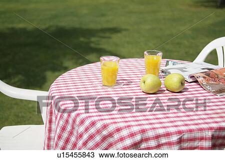 Stock Image - Table and two chairs. Fotosearch