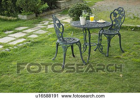 Table and two chairs View Large Photo Image Stock Image - Table and two chairs. Fotosearch