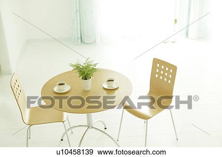 Table and two chairs View Large Photo Image Stock Photo - Table and two chairs. Fotosearch