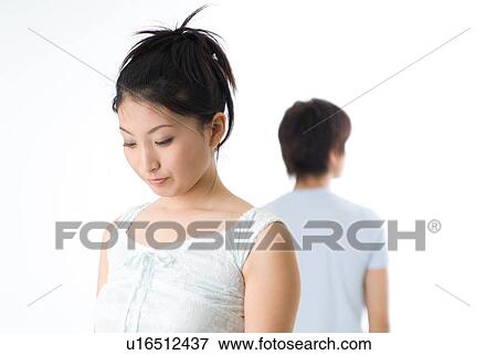 Young couple facing to relationship difficulties View Large Photo Image Stock Photo - Young couple facing to relationship difficulties. Fotosearch
