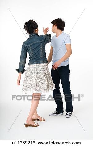 Young woman slapping her boyfriend View Large Photo Image Stock Photograph - Young woman slapping her boyfriend. Fotosearch