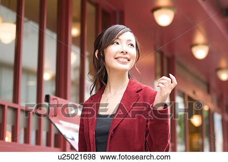 A mid adult woman walking View Large Photo Image Stock Photo - A mid adult woman walking. Fotosearch