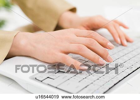 A woman typing, close-up View Large Photo Image Stock Photo - A woman typing, close-up. Fotosearch