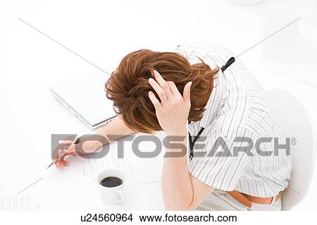 A young man thinking View Large Photo Image Picture - A young man thinking. Fotosearch